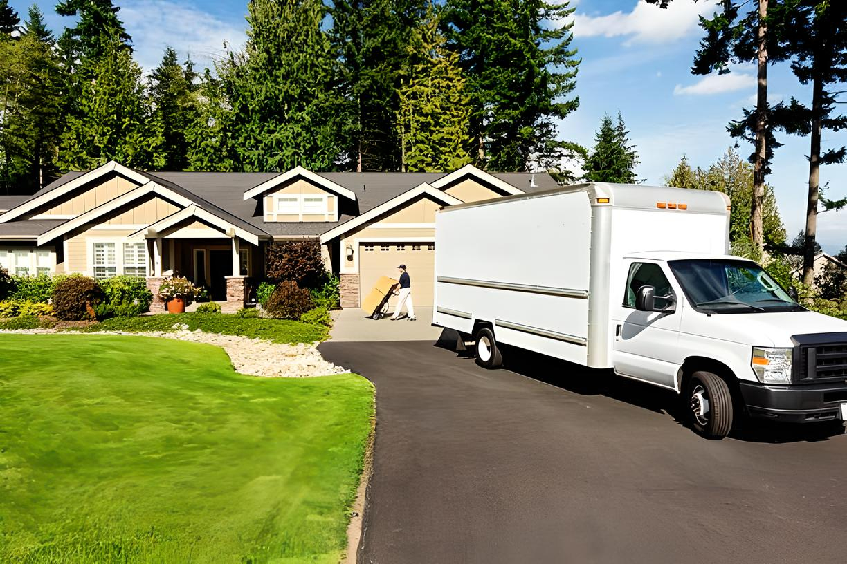 Professional moving labor team carrying furniture into a happy customer's apartment – Express Moving Team LLC provides expert loading, unloading, and heavy lifting services.